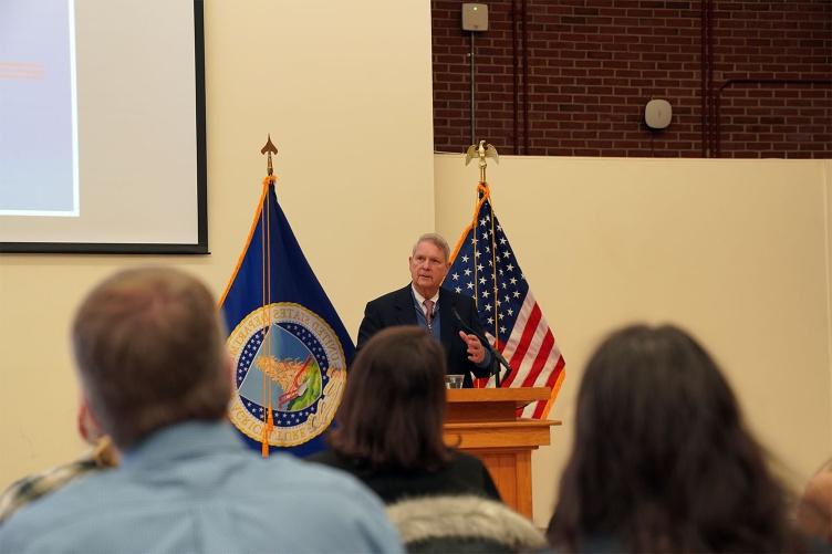 U.S. Secretary of Agriculture Tom Vilsack stands at a podium and talks to members of the UNH community during a townhall held in early January.